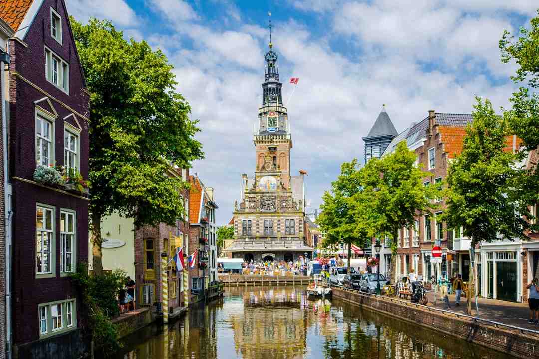 Scenic Alkmaar city center featuring the historic cheese market and canals, representing top escort service Alkmaar.