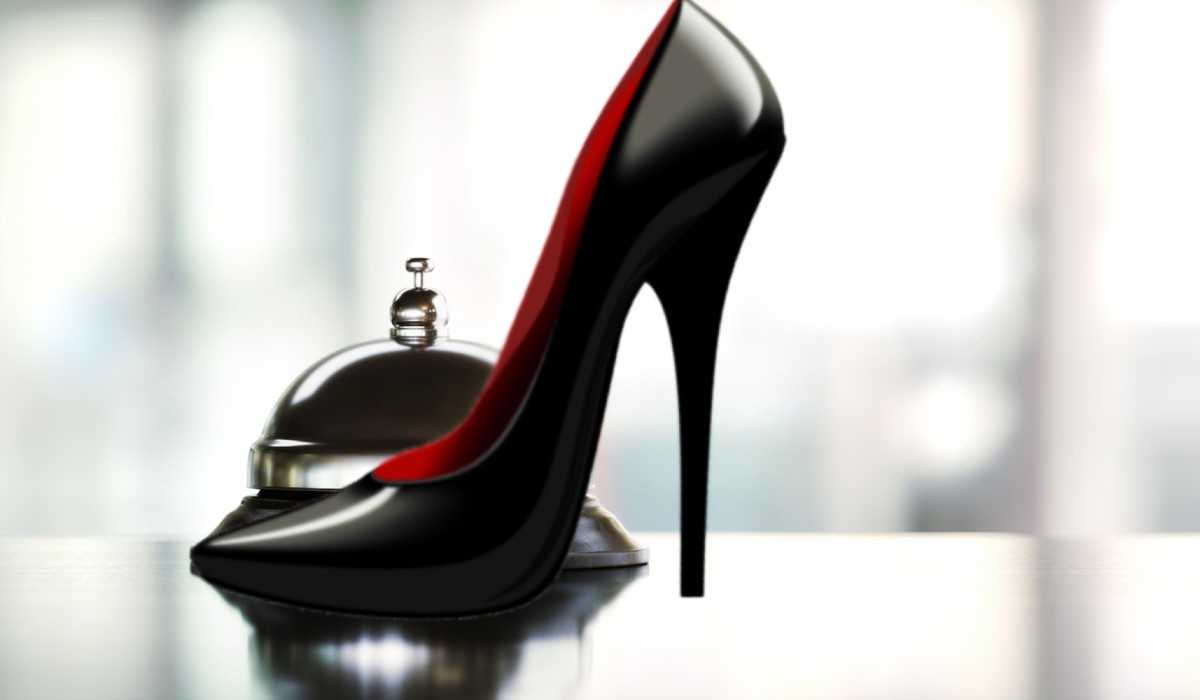 Elegant escort woman arriving at luxury Amsterdam hotel room